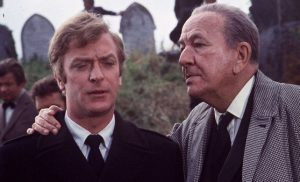 Michael Caine and Noël Coward in The Italian Job