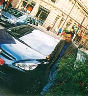 Jack Yan in downtown Helsinki, Finland, with Peugeot 307 HDI
